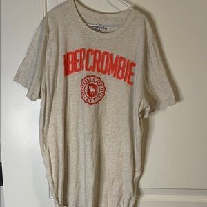 Abercrombie Kids Gray T-Shirt with Orange/peach color, size 14-16, P2p 19”